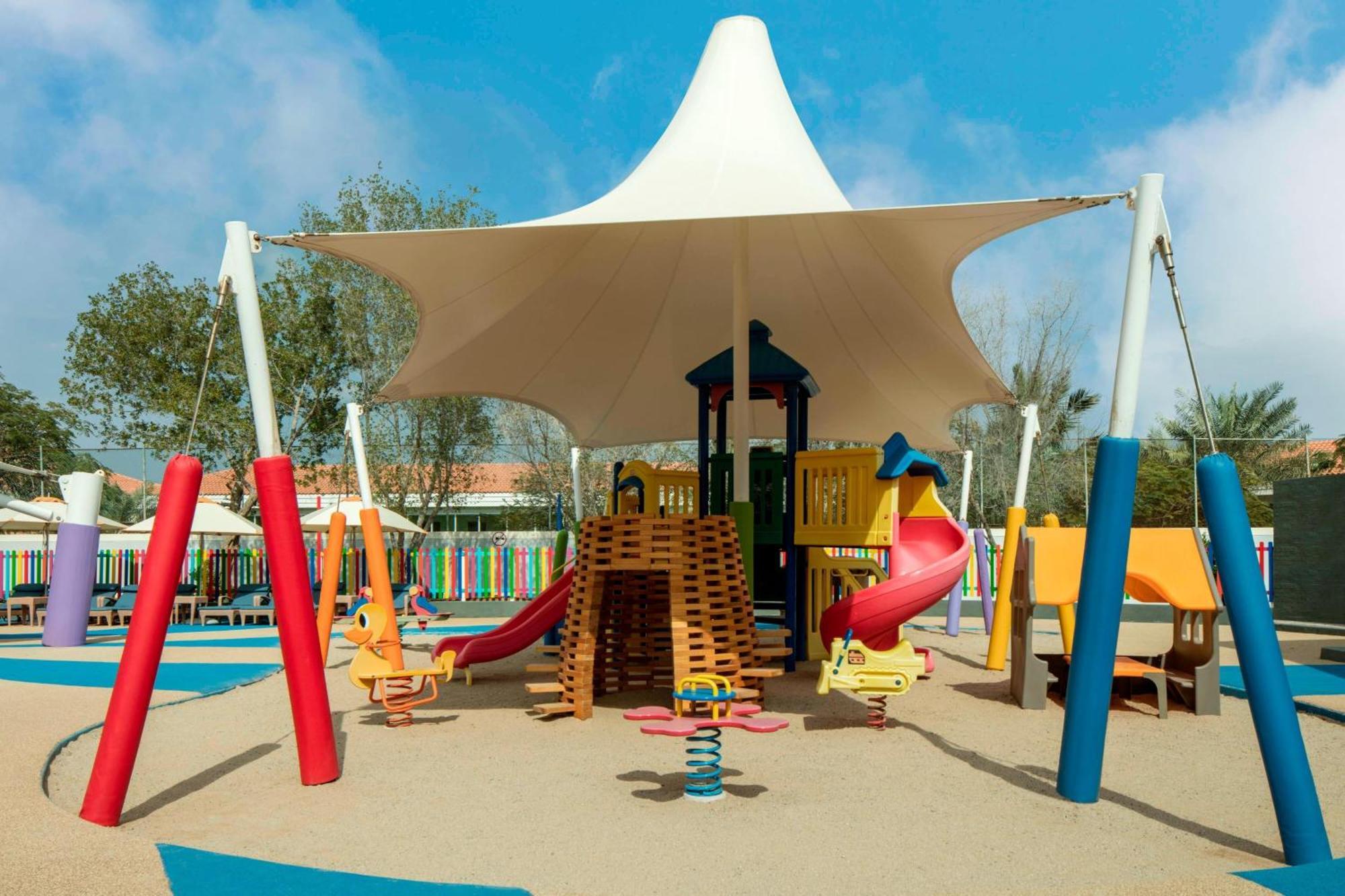 Le Meridien Al Aqah Beach Resort Kültér fotó Playground at the resort