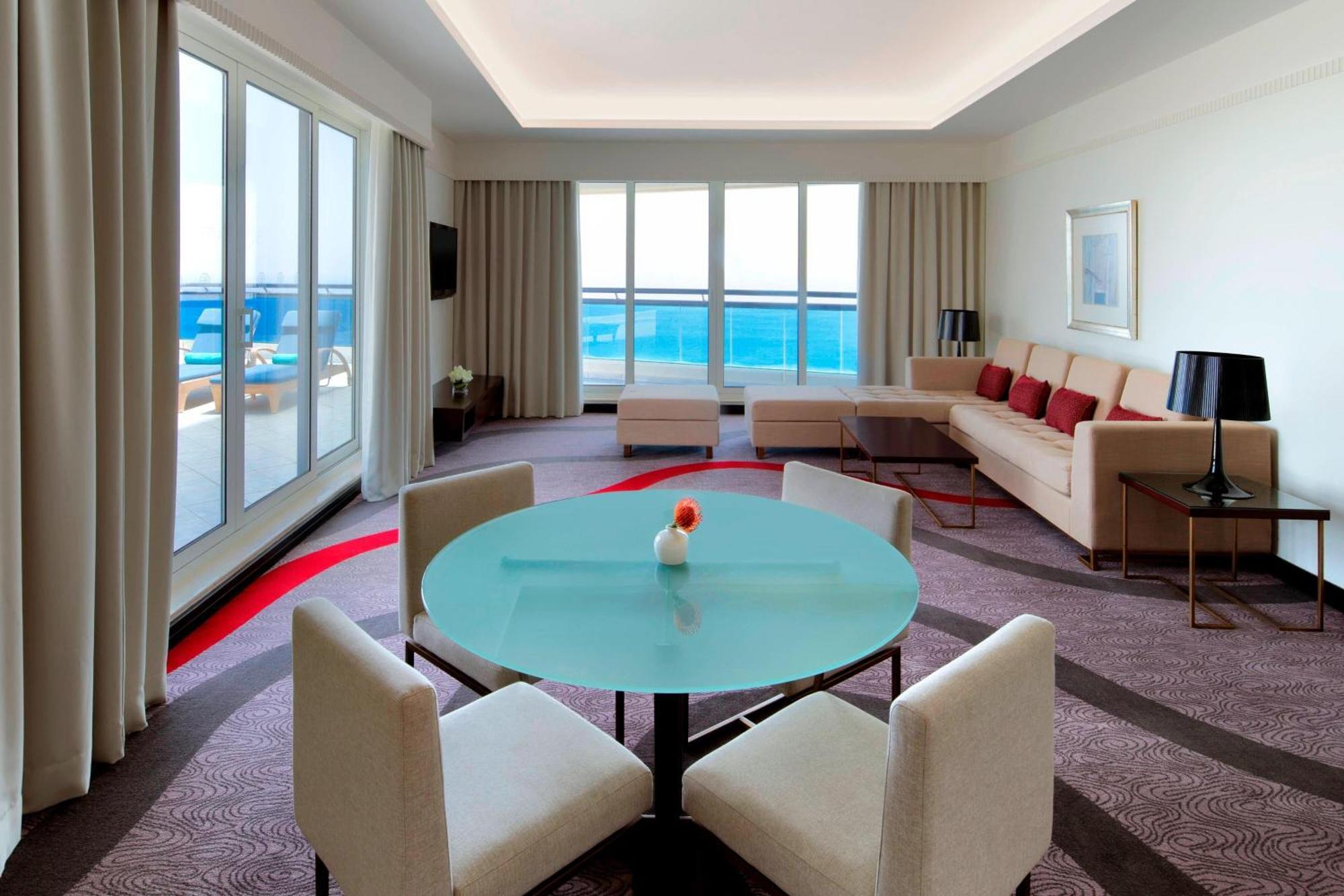 Le Meridien Al Aqah Beach Resort Kültér fotó A suite at the W Doha