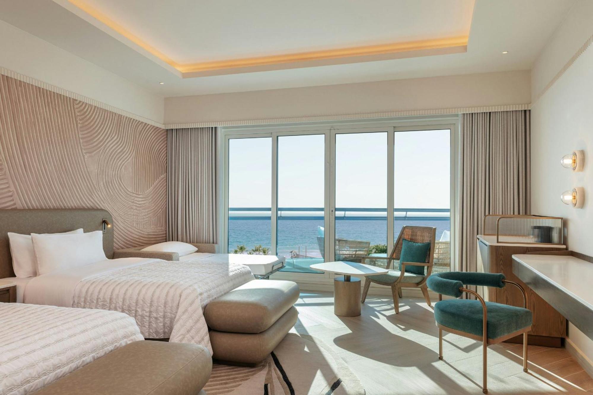 Le Meridien Al Aqah Beach Resort Kültér fotó Deluxe Room